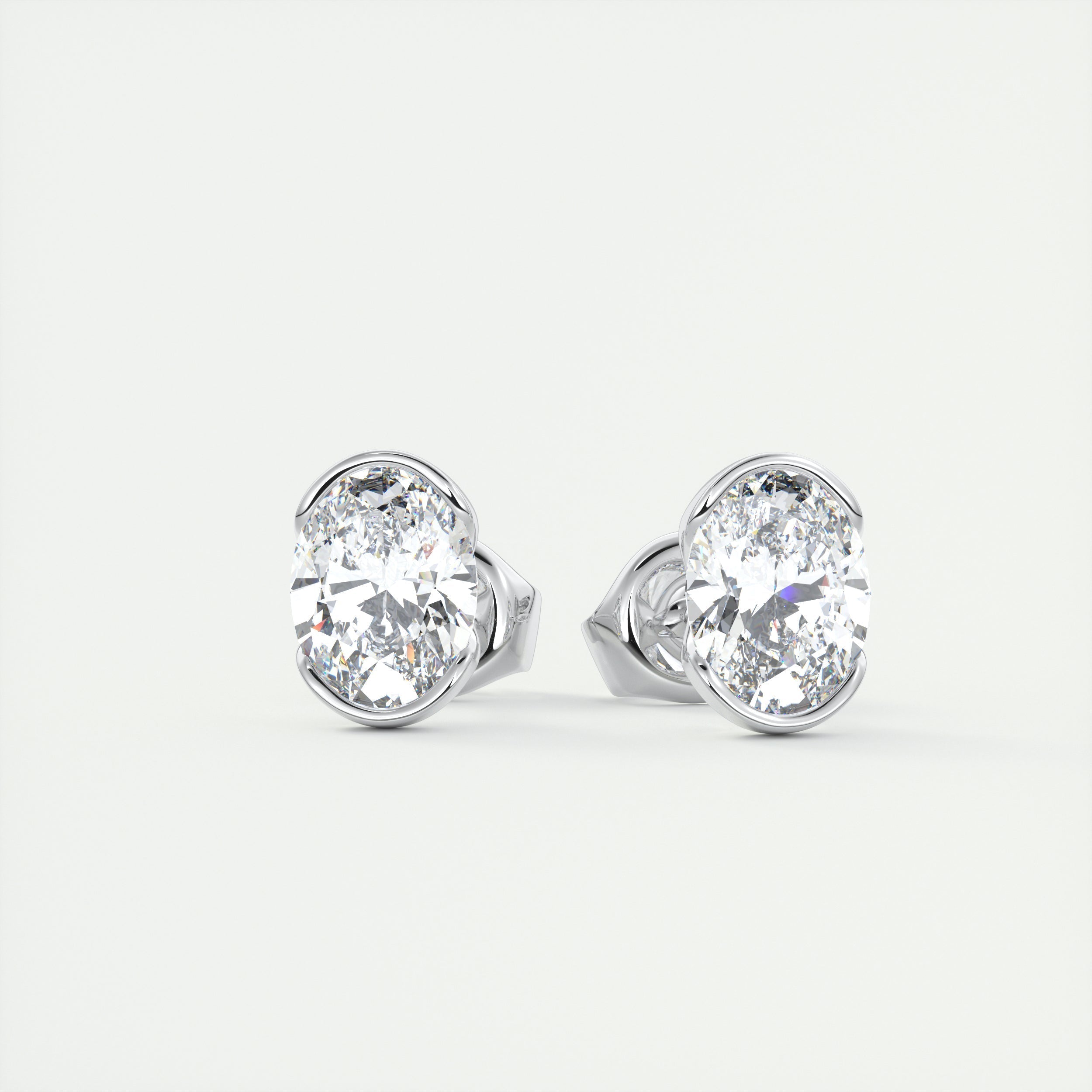 1.0CT Oval Half Bezel Solitaire D-VVS Lab Grown Diamond Earrings