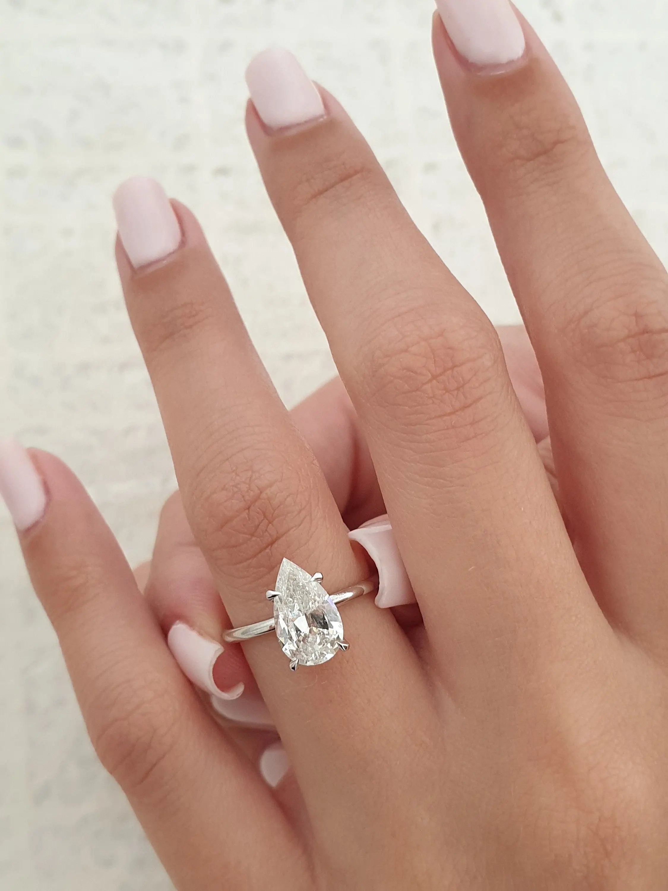 2.0 Ct Pear D-VVS Lab Grown Diamond Hidden Halo Engagement Ring