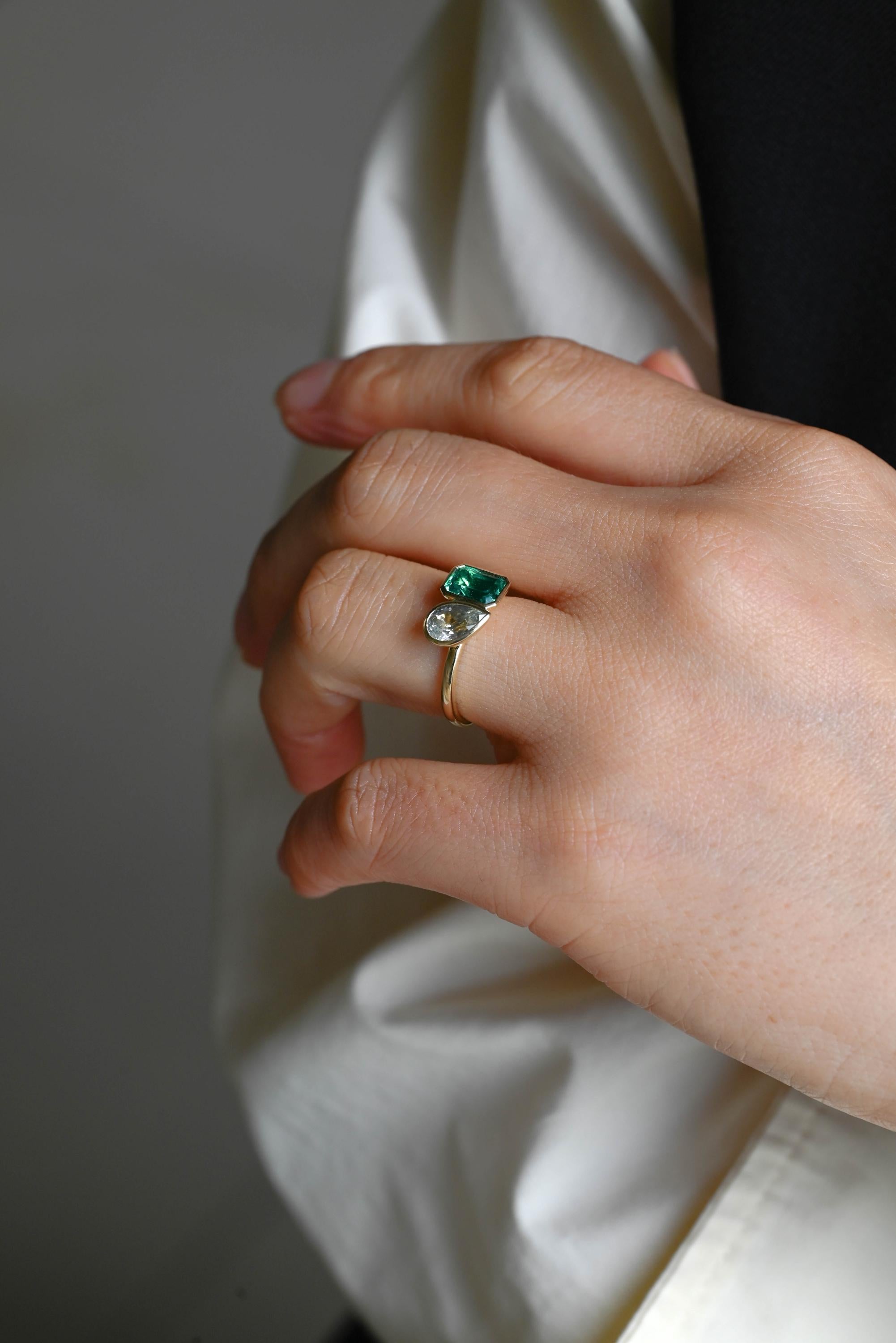 Solid Gold Toi et Moi Lab Grown Emerald & Pear Santa Maria Color Sapphire Engagement Ring