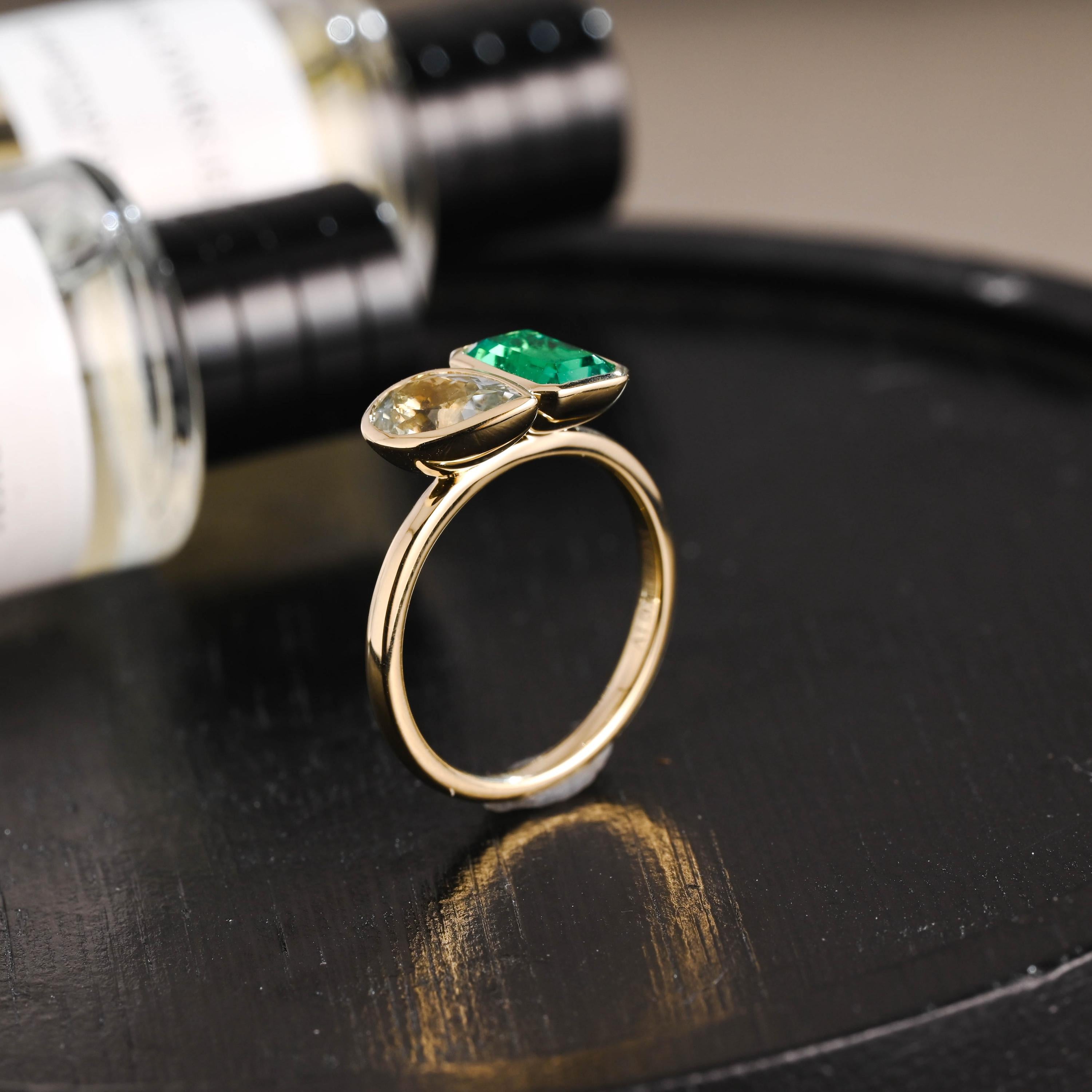 Solid Gold Toi et Moi Lab Grown Emerald & Pear Santa Maria Color Sapphire Engagement Ring