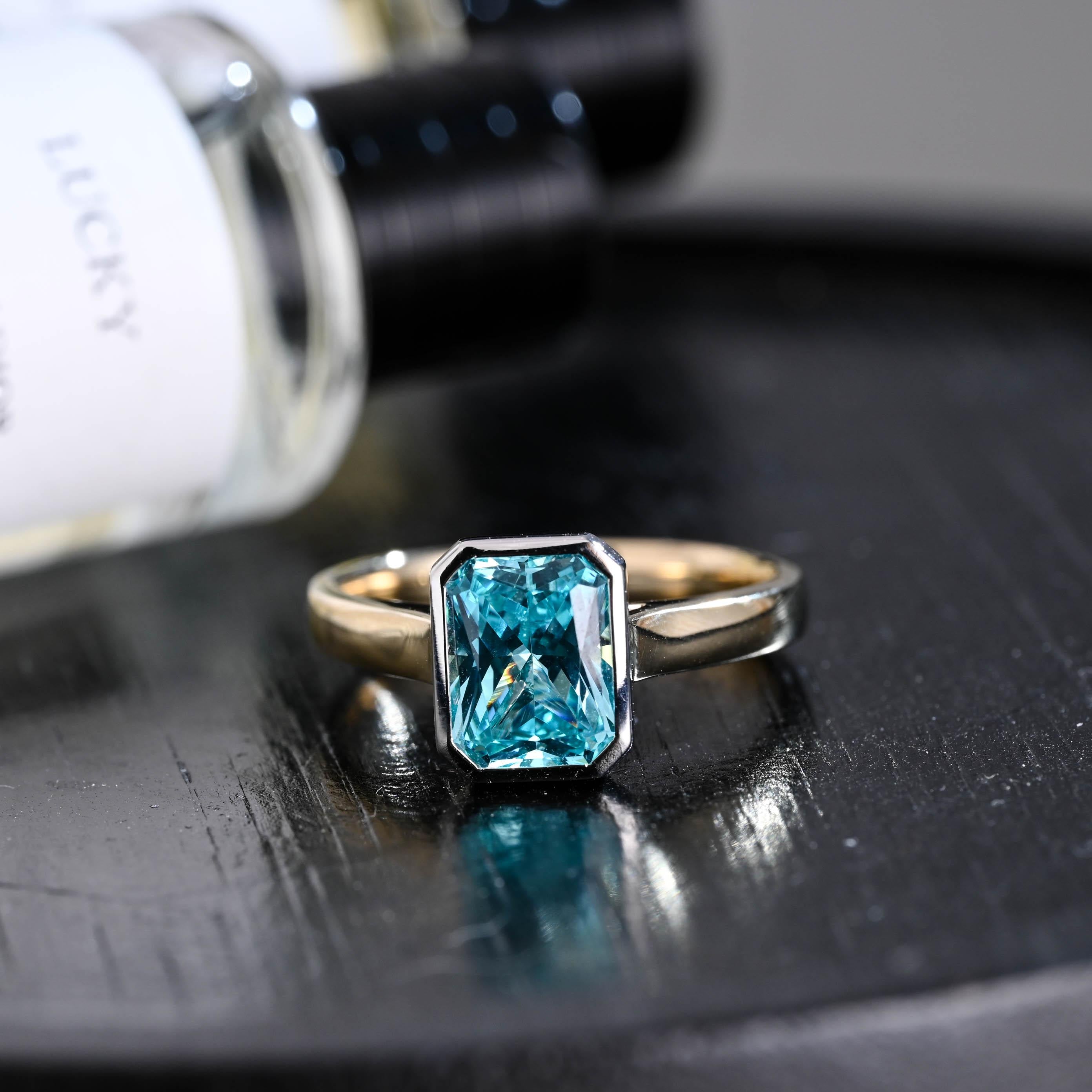 Solid Gold Radiant Cut Aquamarine Color Sapphire Engagement Ring, Two Tone Bezel Proposal Ring