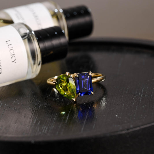 Solid Gold Toi et Moi Emerald Cut Lab Grown Sapphire & Pear Peridot Engagement Ring