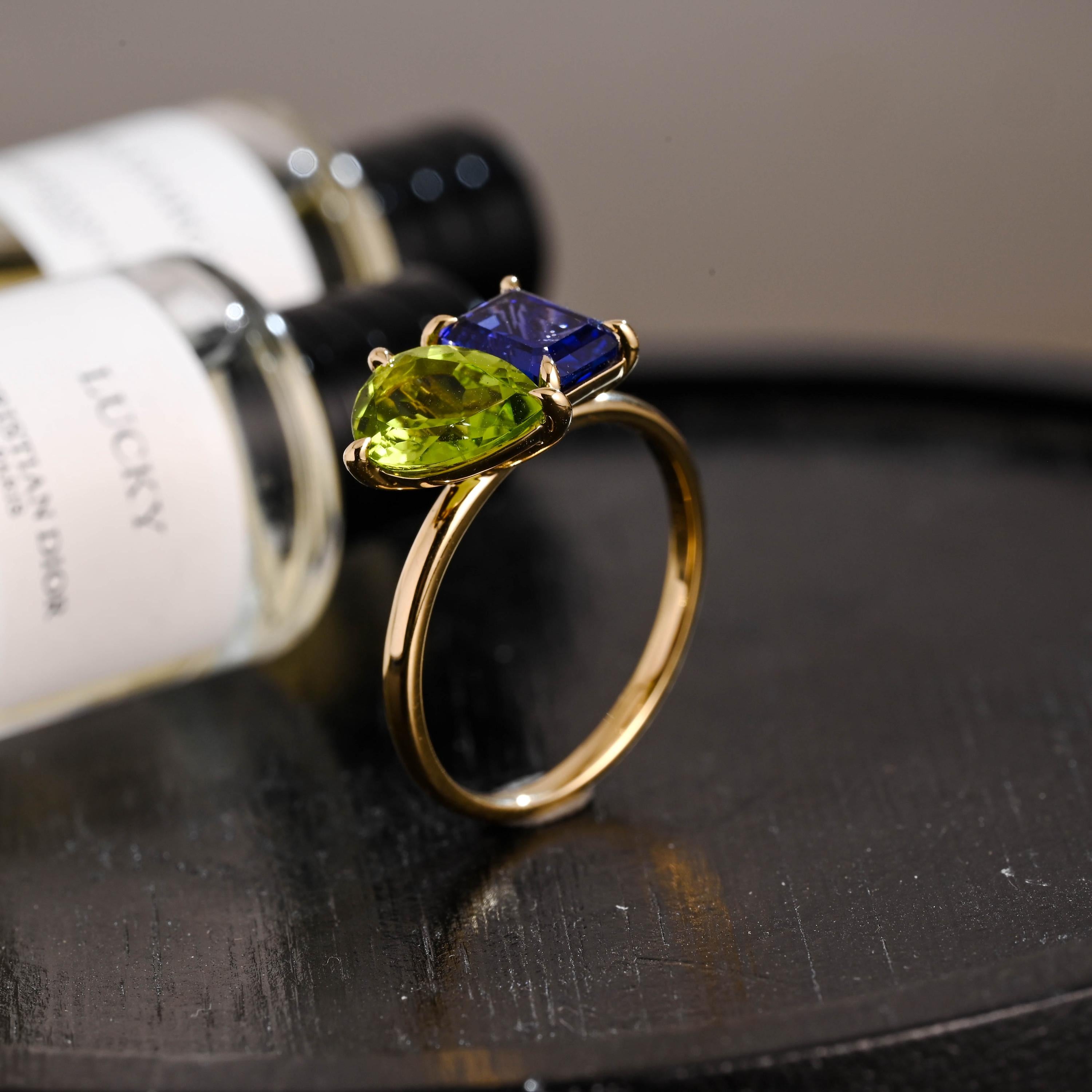 Solid Gold Toi et Moi Emerald Cut Lab Grown Sapphire & Pear Peridot Engagement Ring