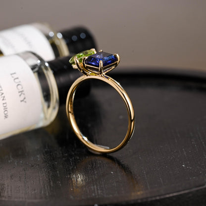 Solid Gold Toi et Moi Emerald Cut Lab Grown Sapphire & Pear Peridot Engagement Ring