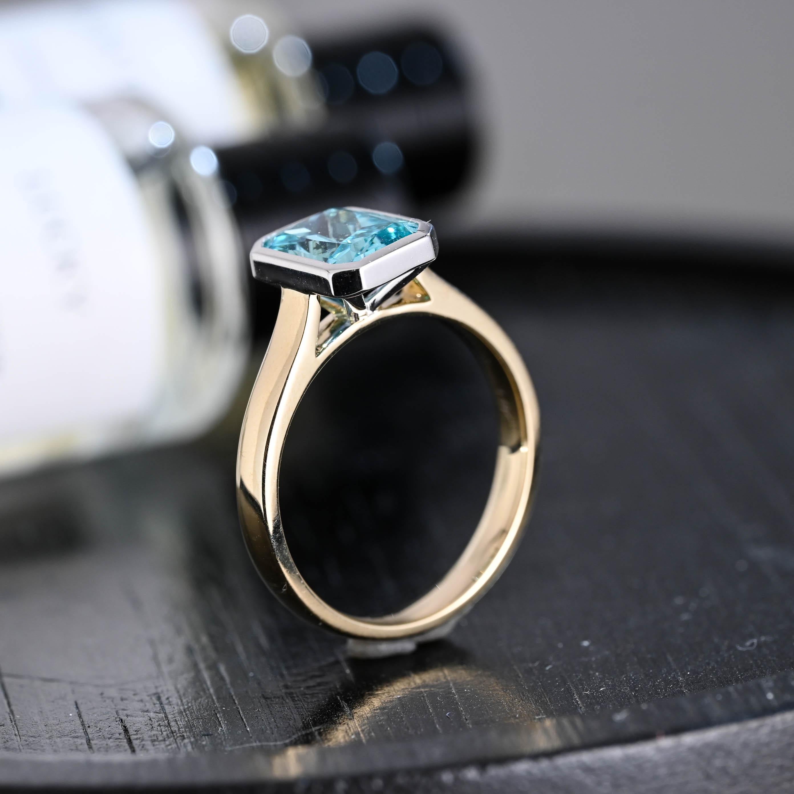 Solid Gold Radiant Cut Aquamarine Color Sapphire Engagement Ring, Two Tone Bezel Proposal Ring