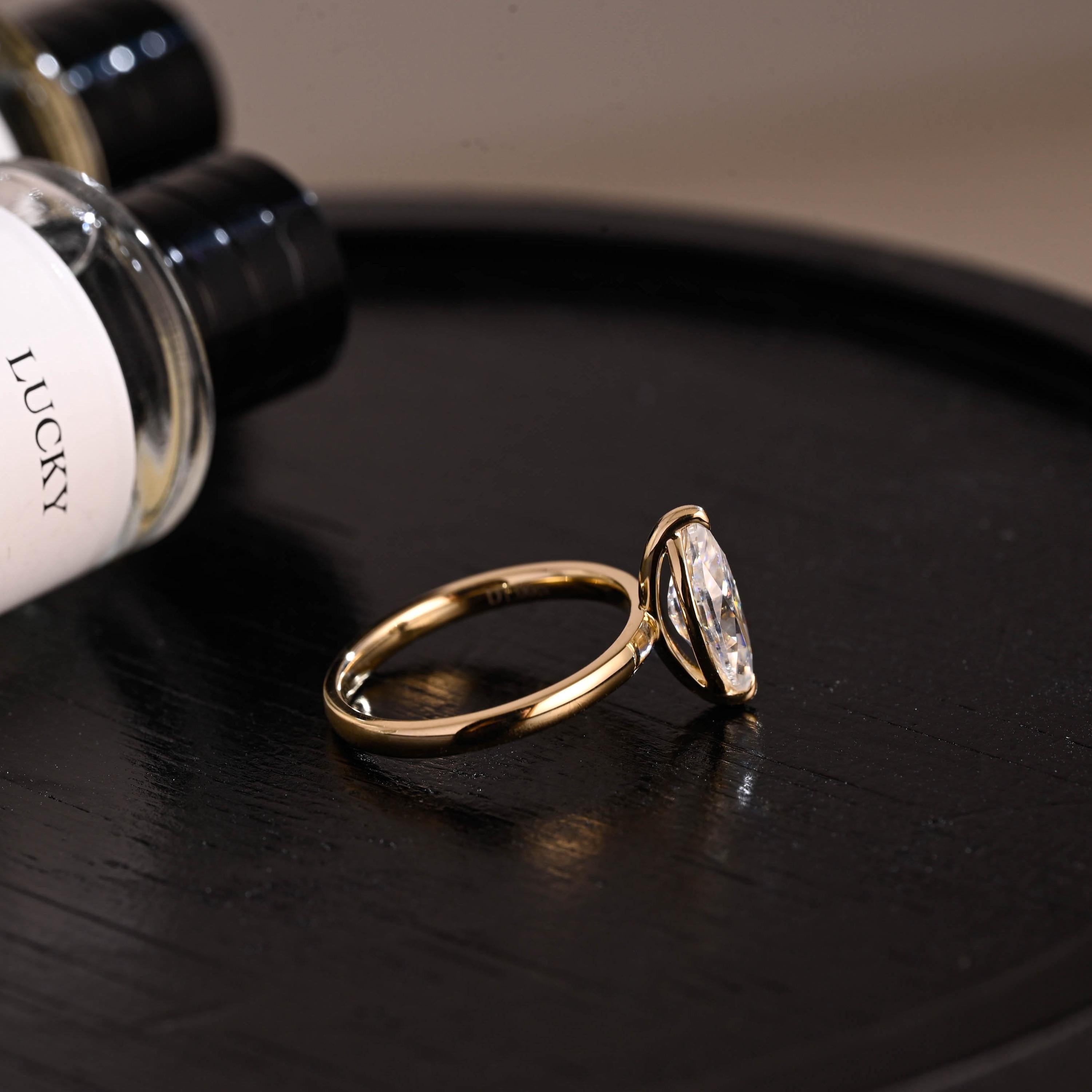Solid Gold Solitaire Marquise Cut Moissanite Engagement Ring, Two Prongs Setting