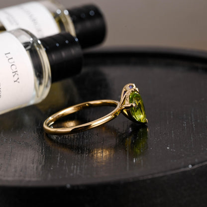 Solid Gold Toi et Moi Emerald Cut Lab Grown Sapphire & Pear Peridot Engagement Ring
