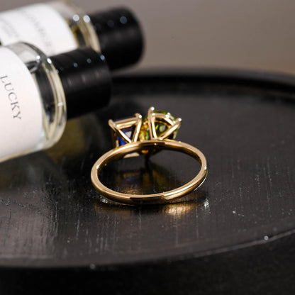 Solid Gold Toi et Moi Emerald Cut Lab Grown Sapphire & Pear Peridot Engagement Ring