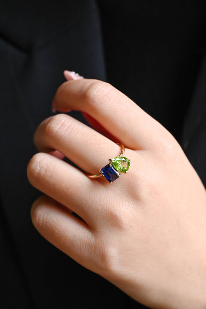 Solid Gold Toi et Moi Emerald Cut Lab Grown Sapphire & Pear Peridot Engagement Ring