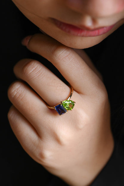 Solid Gold Toi et Moi Emerald Cut Lab Grown Sapphire & Pear Peridot Engagement Ring