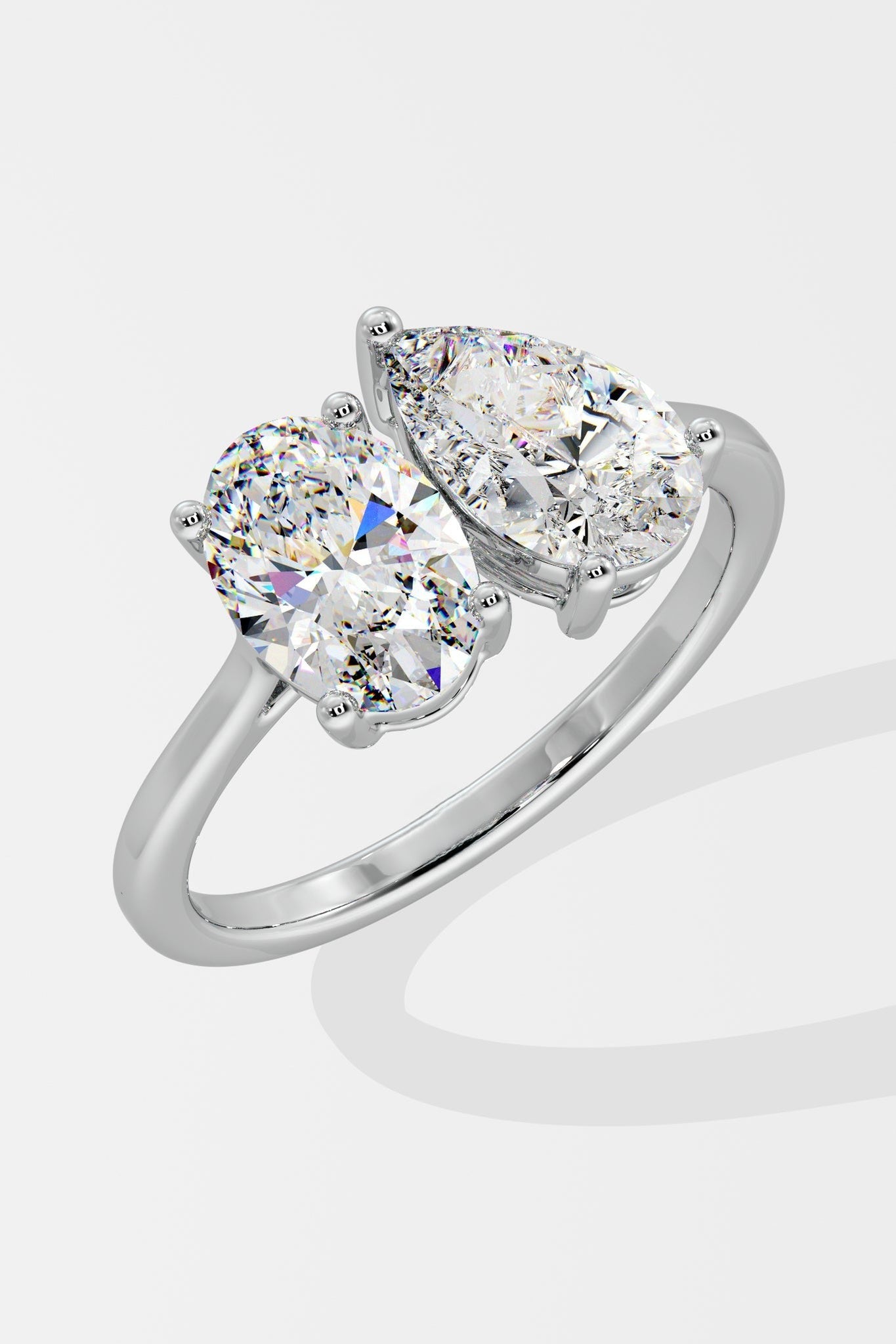 1.0 CT Pear & Oval Mixed Cut Lab Grown Diamond 4 & 3 Prong Set Solitaire Diamond Ring