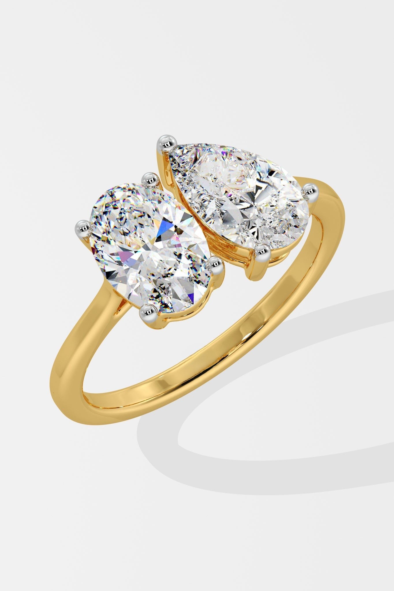 1.0 CT Pear & Oval Mixed Cut Lab Grown Diamond 4 & 3 Prong Set Solitaire Diamond Ring