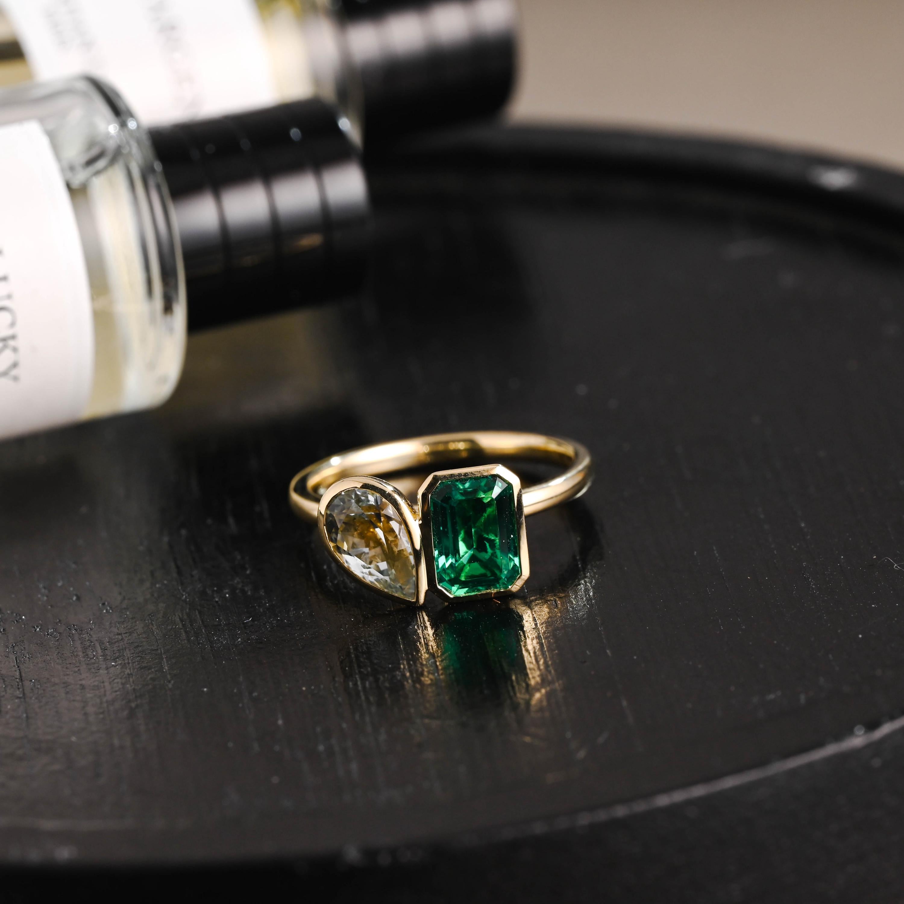 Solid Gold Toi et Moi Lab Grown Emerald & Pear Santa Maria Color Sapphire Engagement Ring
